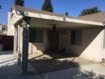 16'5x15' attached, fascia mounted Durawood, flatwood patio cover with diamond end caps. Color: California Sand - Sacramento, CA