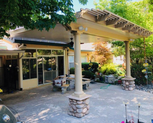 17'x18' 3" insulated attached, roof mounted patio cover with 18"x18' front lattice end design: scallop Color: California Sand Trim: Southwood.  2 footings (2) 10" round columns Electrical: 4 LED's, 2 lights, 1 high outlet, 1 low outlet, 1 fan - Granite Bay, CA