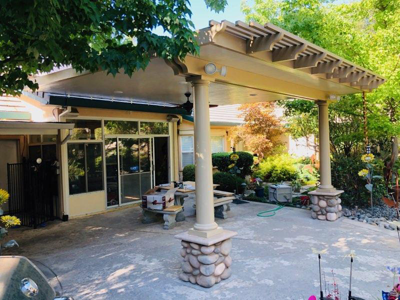 17'x18' 3" insulated attached, roof mounted patio cover with 18"x18' front lattice end design: scallop Color: California Sand Trim: Southwood.  2 footings (2) 10" round columns Electrical: 4 LED's, 2 lights, 1 high outlet, 1 low outlet, 1 fan - Granite Bay, CA