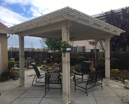 12x12 solid flatwood patio cover w/lattice, 14x14 overall with Corbel end caps. Color: California sand - Sacramento, CA