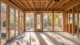Sunroom interior under construction featuring wooden framing, large windows for natural light, and a view of the outdoors, relevant to sunroom installation considerations in Sacramento.